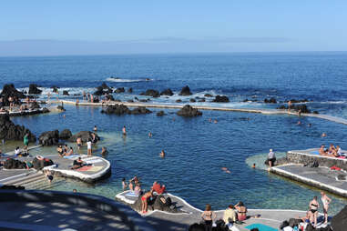 natural volcanic lava swimming pools porto moniz madeira island, portugal