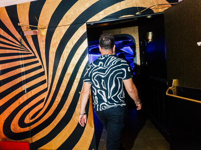 man entering a music venue