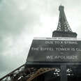 A view of an information board in front of the Eiffel Tower as staff went on strike to protest over the way the monument is managed financially in Paris, France on February 19, 2024.