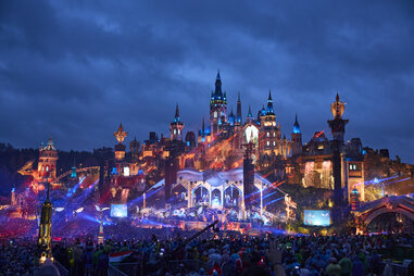 a fairytale-like stage and a crowd of people