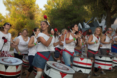 a group of women with drums