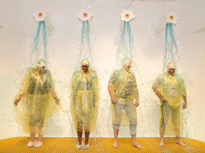 museum patrons get covered in slime at sloomoo institute slime museum in los angeles