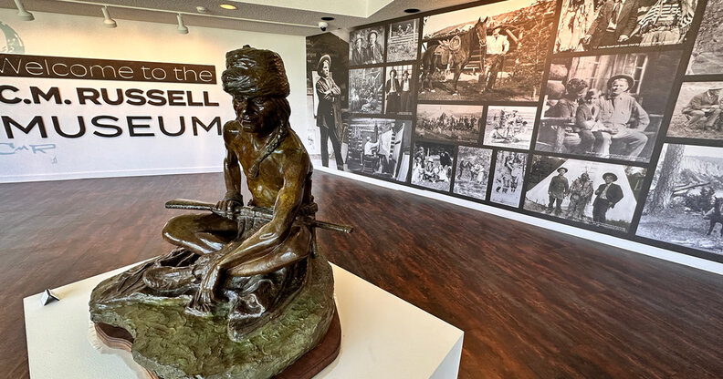 a statue of a Native American at the C.M. Russell Museum