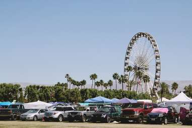 car camping and ferris wheel at coachella music festival near palm springs