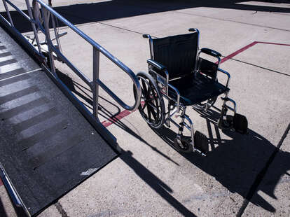 A slope for a wheelchair to board an airplane