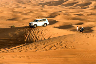 Tourists are seen having fun on tours in Lahbab Desert in Dubai, United Arab Emirates on September 17, 2022.