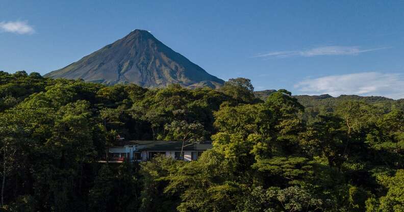 costa rican arenal volcano surrounded by jungle and hot springs