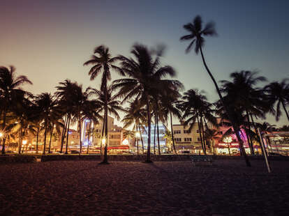 Ocean Drive street with illuminated buildings in South Beach, Florida
