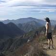 california hiker atop strawberry peak hike in the san gabriel mountains near los angeles