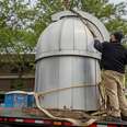 NYC's first public observatory in the midst of being transported, pre-refurbishment