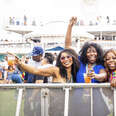 three women drinking on a cruise ship music festival rock the bells