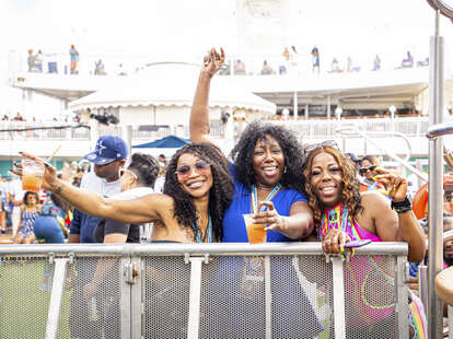 three women drinking on a cruise ship music festival rock the bells