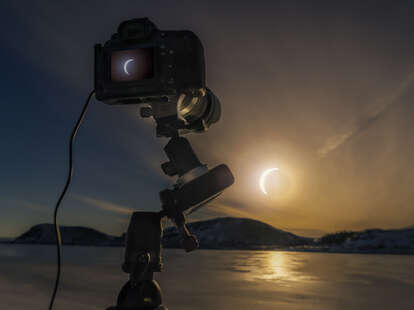 Camera set up photographing a solar eclipse in Iceland