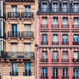 Residential 19th century style residential buildings in historic center of Paris, France.