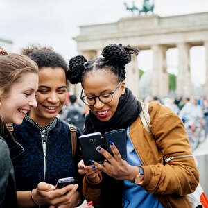 A group of friends travelling together are exploring the local attractions in Berlin