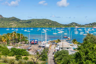 View of the port and lagoon with anchored yachts at Carriacou island, Grenada, Caribbean sea