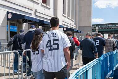 New York Yankees fans don pinstripe jerseys on gameday