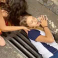 Girl Reaches Into Storm Drain And Comes Up Holding A New Best Friend