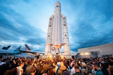 space shuttle and electronic music festival crowd at national air space museum france