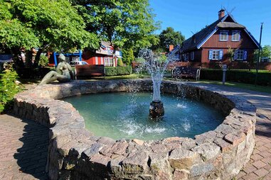 nida lithuania town fountain curonian spit