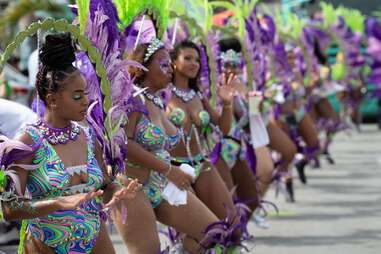 women in purple at the Carnival Parade in Sint Maarten in May 2022