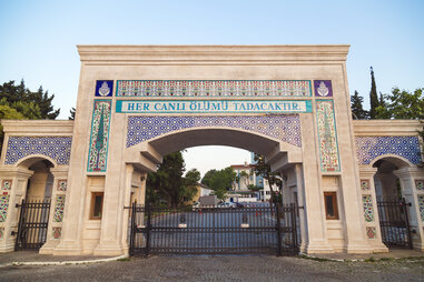 stone gate zincirlikuyu municipal cemetery istanbul turkey inscription