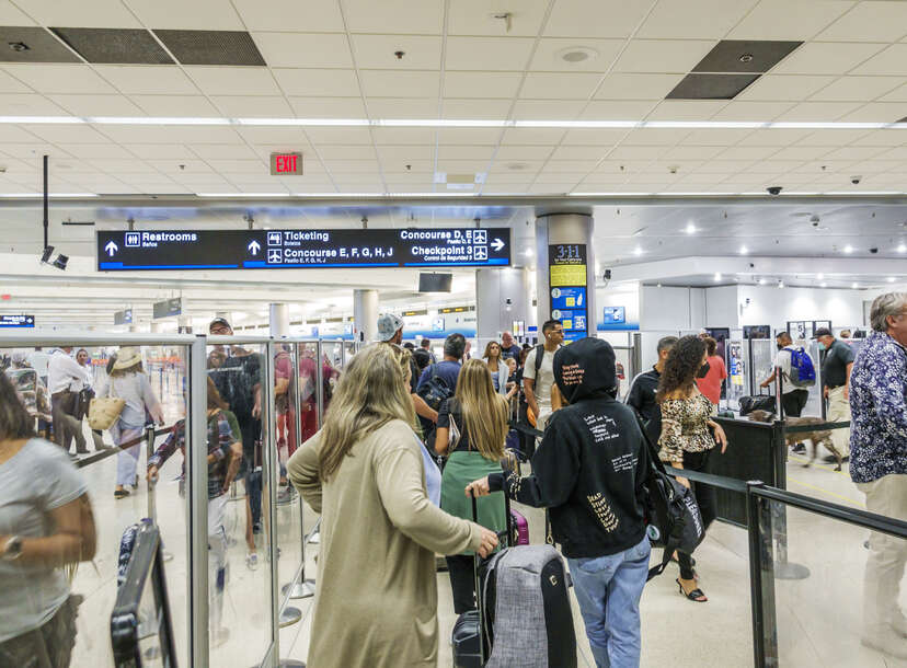 Miami International Airport MIA terminal crowded at TSA security line