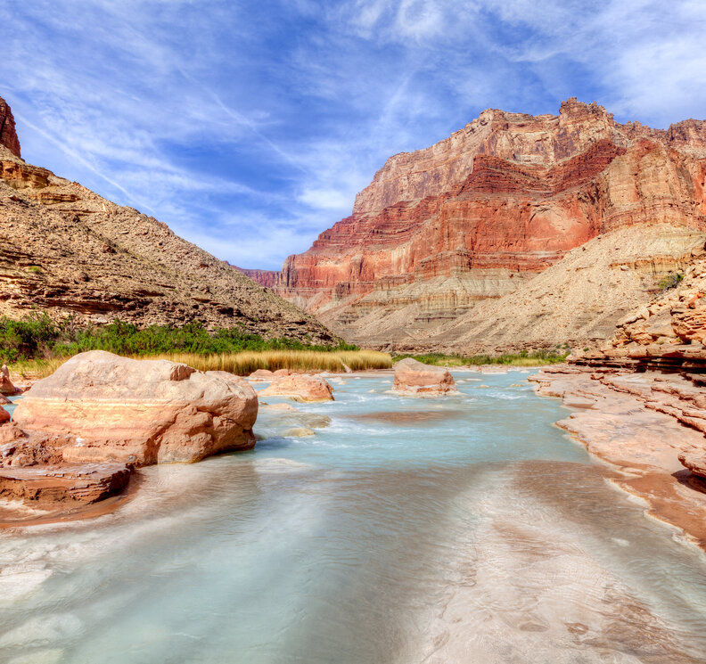 a milky blue river in the Grand Canyon, made so by calcium carbonate