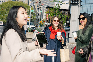 Chloe Chan recounts historical stories with the help of iPad visuals on a Mott Street Girls tour