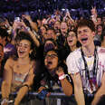 Fans watch Taylor Swift perform during night two of Taylor Swift's Eras tour in Paris