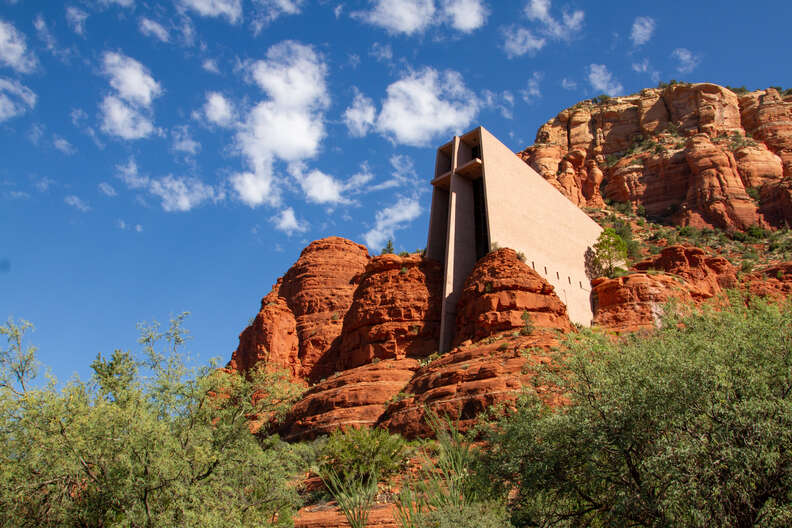 a concrete rectangular Chapel of the Holy Cross built into the red rocks of Sedona