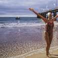 mayra santos female swimmer outstretched arms