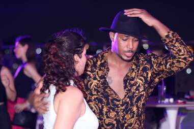 hotel deauville havana cuba salsa dancers man in fedora and woman