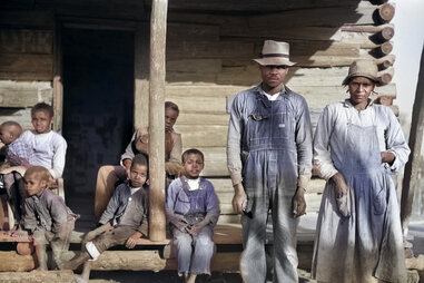 pettway family standing on porch in 1937 six children two parents