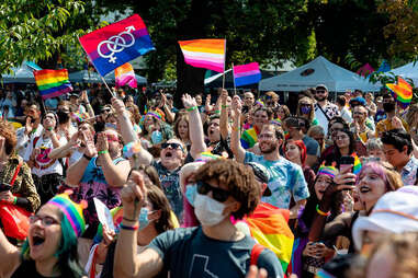 The audience cheers for performers on stage in the HomeTown Drag Spectacular at the Boise Pride festival