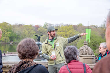 A guide on The Central Park Conservancy’s Heart of the Park Tour leads participants by the Bethesda Terrace