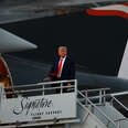 trump boarding his private jet