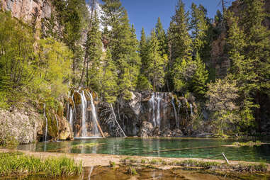 A morning spring view of Hanging Lake in the White River National Forest near Glenwood Springs, Colorado.