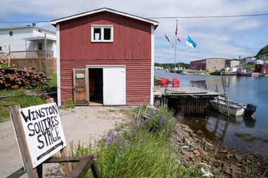 newfoundland red barn near water