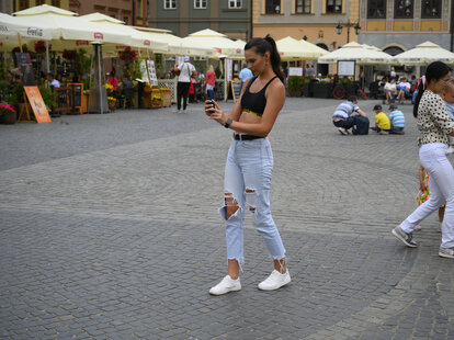 woman taking a selfie warsaw, poland