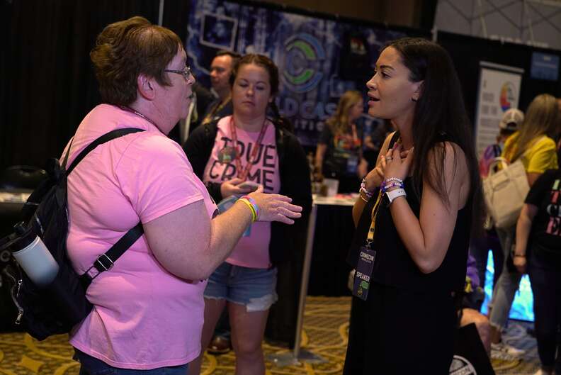 madison mcghee talking with CrimeCon attendee in nashville