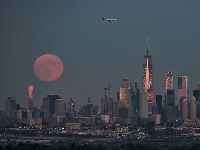 strawberry moon over manhattan