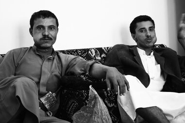 Men in Sana’a, Yemen chewing khat