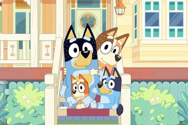 A photo of the animated show Bluey, featuring Bluey, Bingo, Chili, and Bandit. 