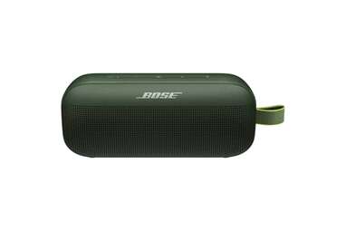 A picture of a small, oval shaped green Bose speaker. 