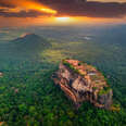 Aerial view of Sigiriya rock at sunset in Sri Lanka.