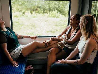Young women commuting on a train
