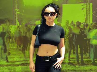 Charli XCX in front of a green backdrop.