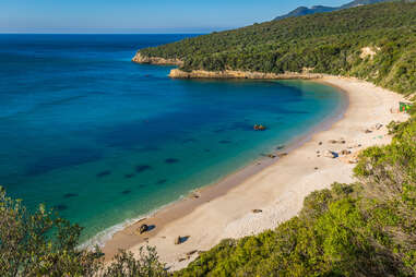 beach bay in Portinho da Arrabida, Portugal, in a national park.  Arrábida is one of the most beautiful places in Portugal. 