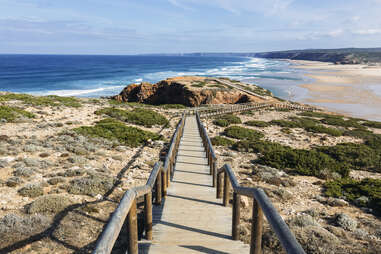 long stairs going town to Bordeira beach, Algrave, portugal